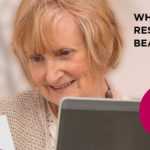 Lady Looking at Join Dementia Research leaflet