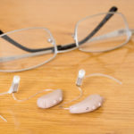 Close up hearing aids and glasses