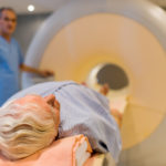Patient lying down for a PET scan